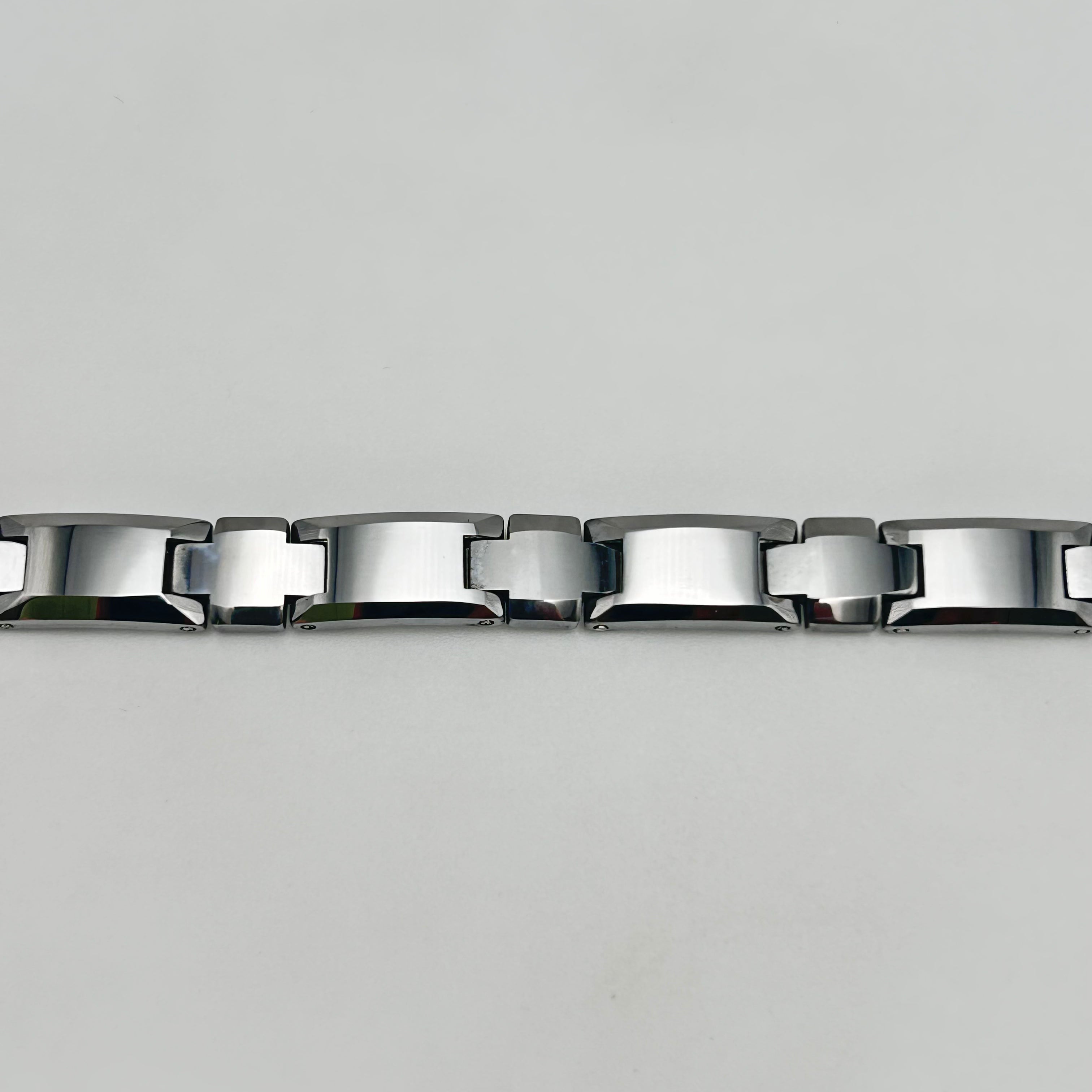 A silver tungsten bracelet with a link chain design.