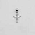 Silver color cross pendant with clear stones