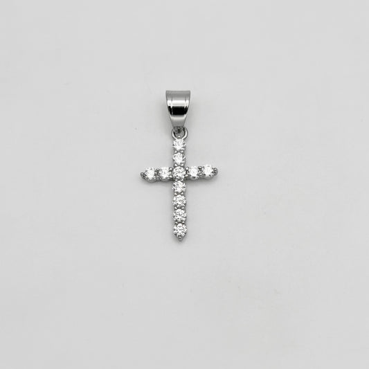 Silver color cross pendant with clear stones